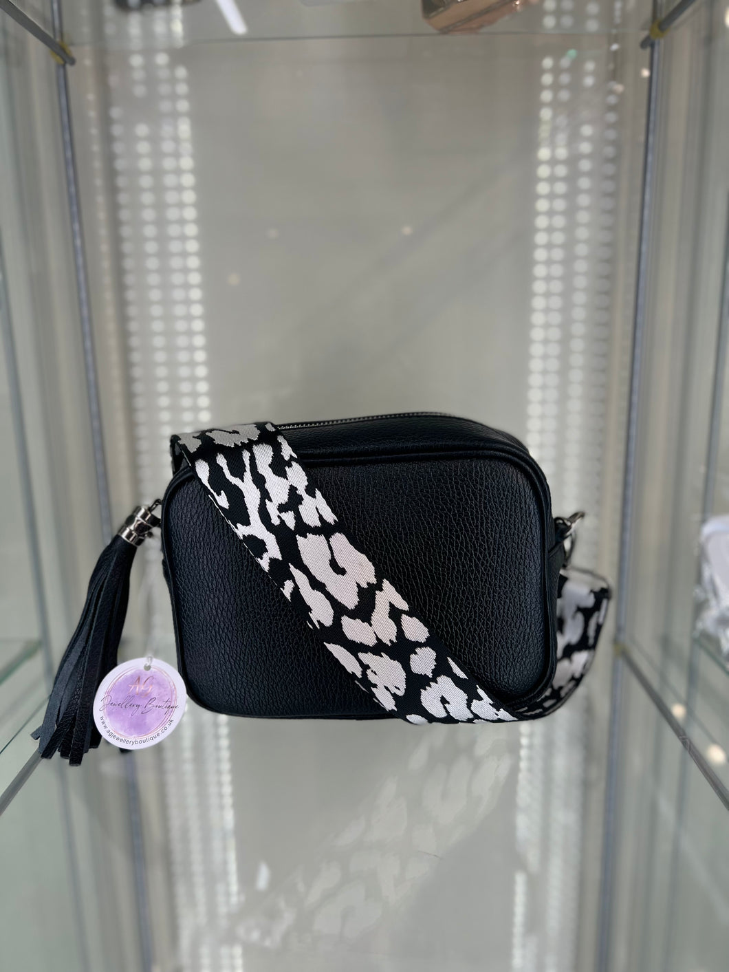 Real leather Black crossbody bag with  animal print black/white strap